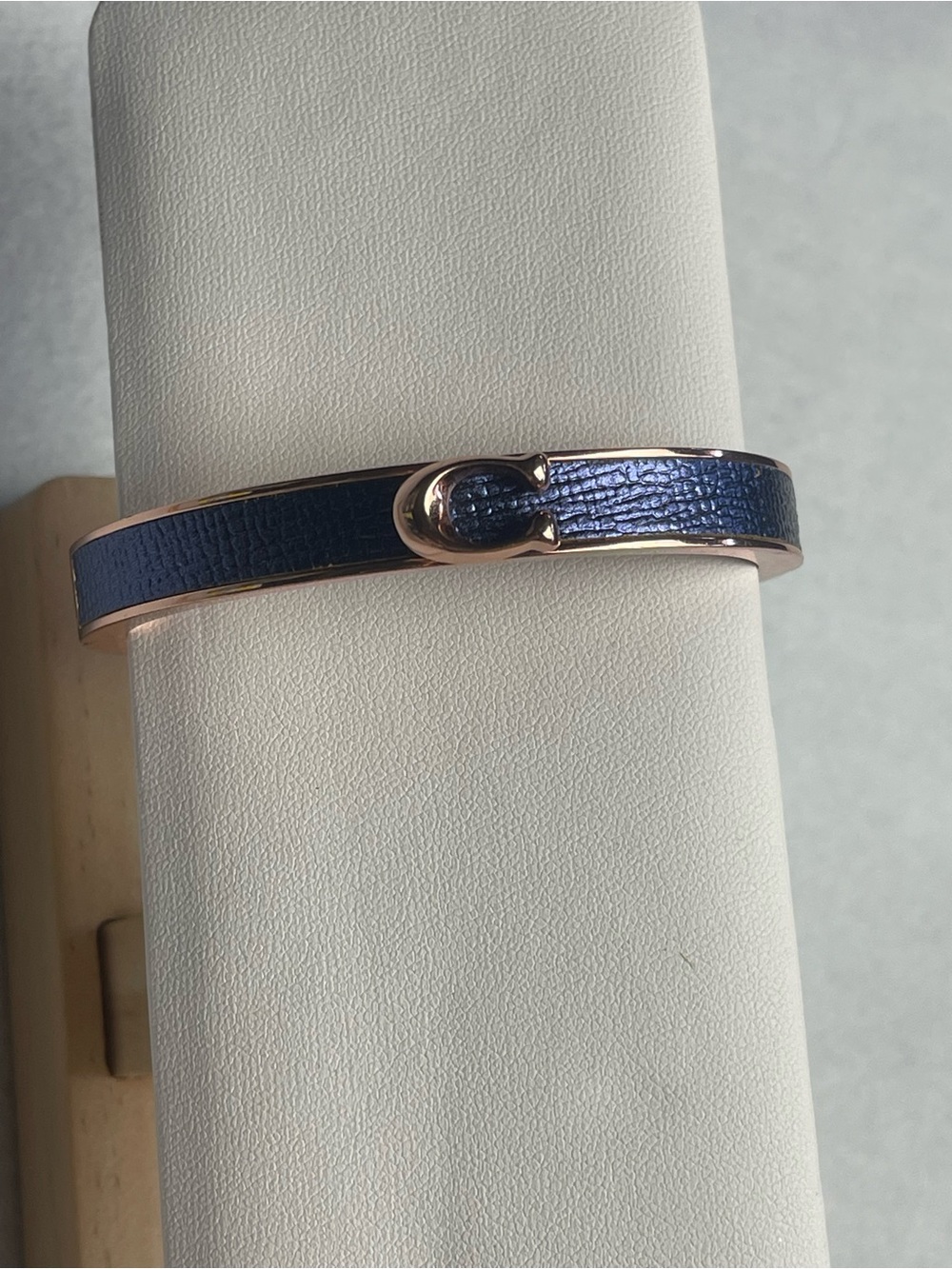Coach Rose Gold-Tone Navy Leather Buckle Hinge Bracelet